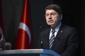 bakan-tunctan-ozgur-ozele-sert-cevap-2x20.jpg